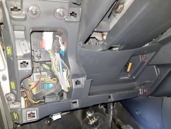 The location of the additional fuse box in the passenger compartment