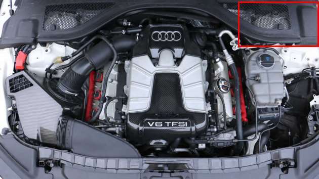 Location of the main fuse box in the engine compartment