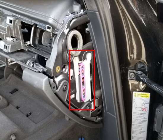 The location of the fuse box in the cabin on the passenger side.