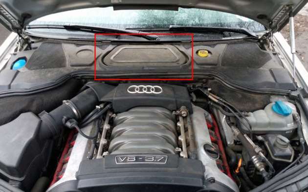 Location of the fuse box in the engine compartment